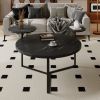 Modern coffee table with two display shelves, Black Faux marble surfaces, Tripod-inspired base,Rounded tabletop edges